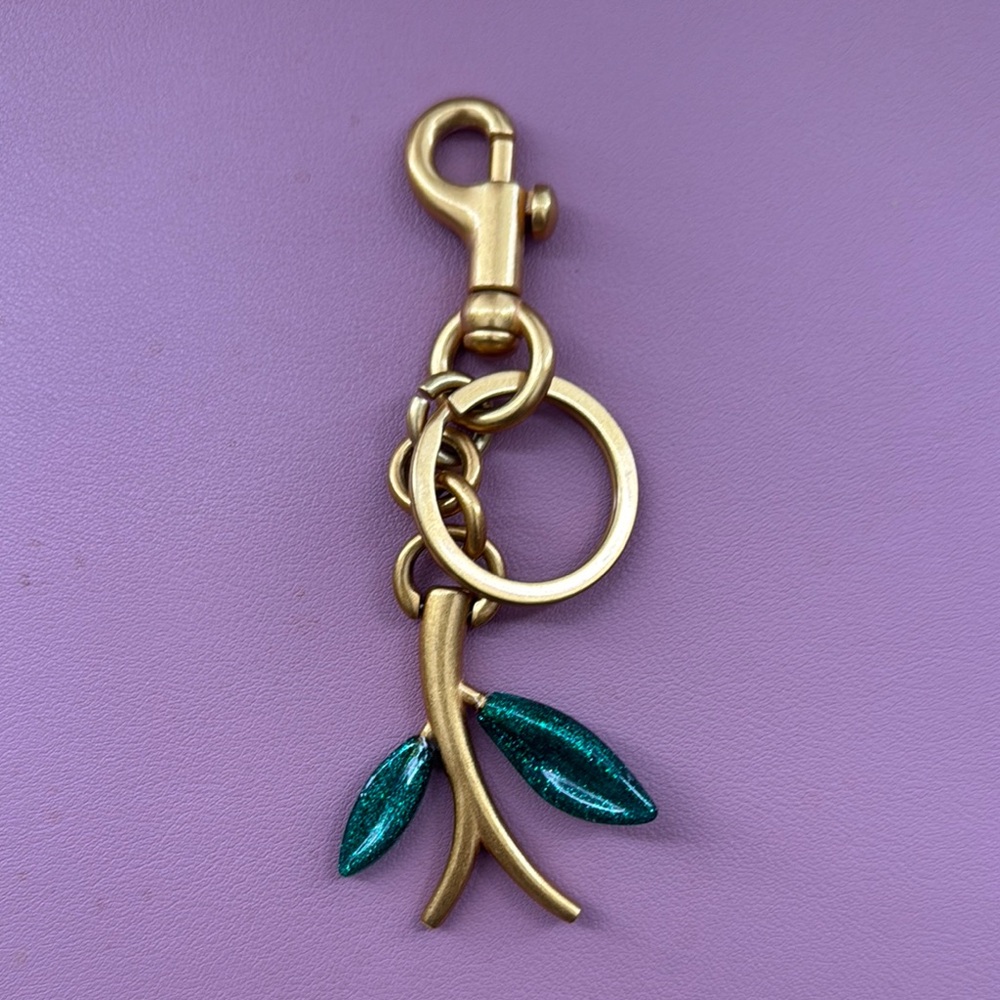 Gold Keychain with Green Leaf Charm
